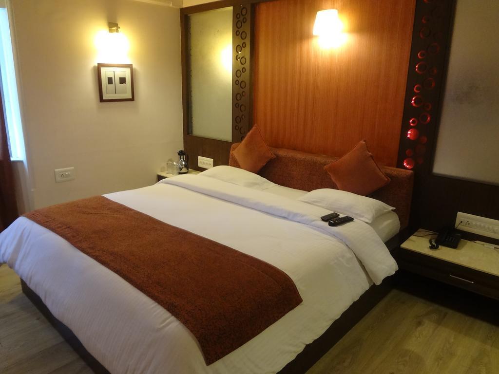 Hotel Royal Highness Ahmedabad Quarto foto